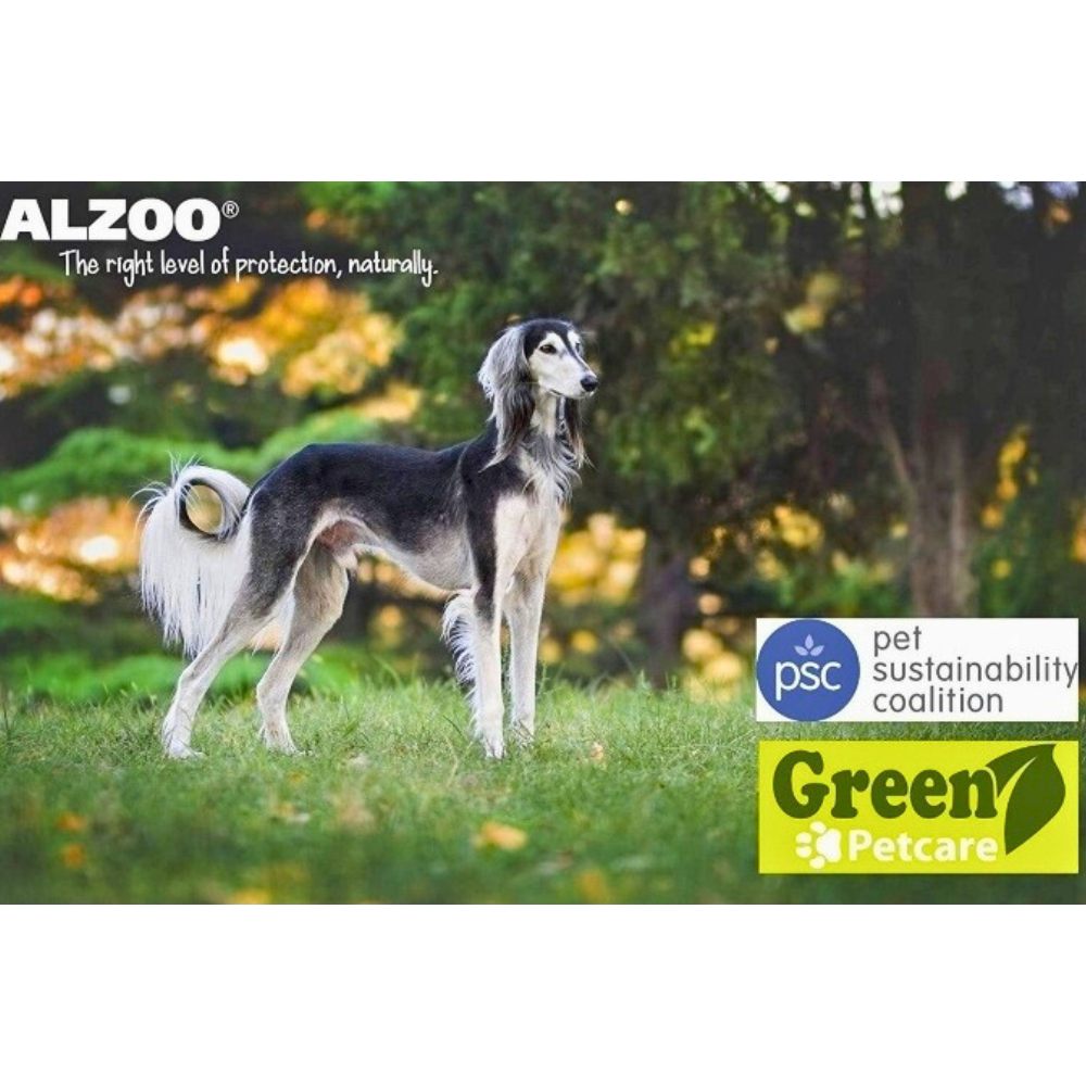 A Saluki dog standing in a grassy field with trees in the background, promoting ALZOO’s natural pet protection; features logos for the Pet Sustainability Coalition and Green Petcare.