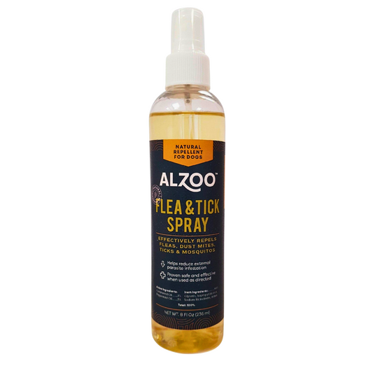 Front view of ALZOO Flea & Tick Spray for dogs, featuring a natural essential oil formula in a clear spray bottle with a black and gold label.