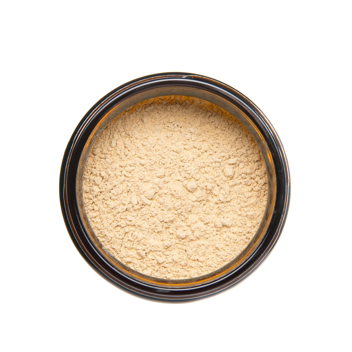 Top view of open glass jar filled with finely ground PAAVANI Ayurveda Ashwagandha root powder.